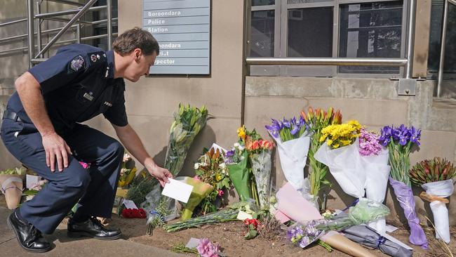 Patton lays a tribute at Boroondara Police following the death of four police officers.