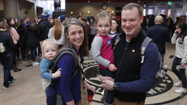 Stephanie and Sam Early with children Isaac and Louise at the Elizabeth Warren rally in Indianola, Iowa. Picture: Matthew Putney