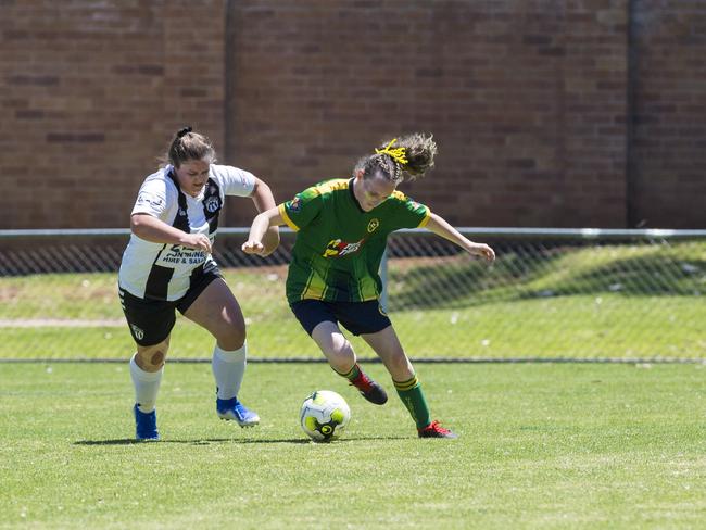 Willowburn player Jacinda Reed (left) and Hayley Warner of Highfields in Toowoomba Football League Premier Women grand final at Clive Berghofer Stadium, Sunday, November 15, 2020. Picture: Kevin Farmer