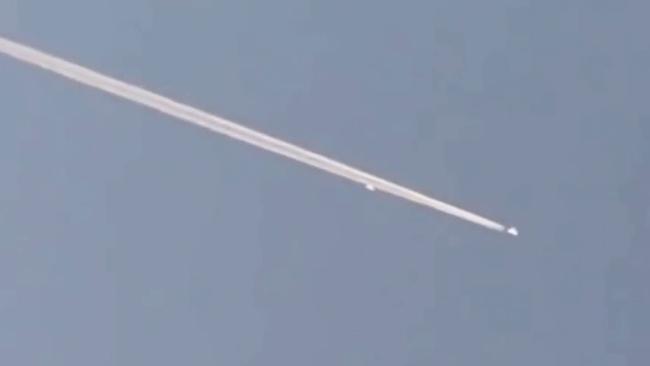 An alleged UFO in apparent proximity to a passenger jet has caused a You Tube sensation.