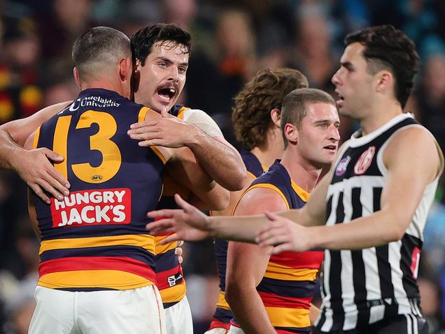 ADELAIDE, AUSTRALIA - MAY 10: Darcy Fogarty of the Crows celebrates a goal with Taylor Walker of the Crows during the 2025 AFL Round 09 match between the Port Adelaide Power and the Adelaide Crows at Adelaide Oval on May 10, 2025 in Adelaide, Australia. (Photo by Sarah Reed/AFL Photos via Getty Images)