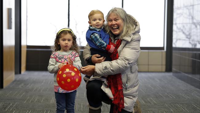 Jan Hutchison, with grandchildren Florencia and Leonardo, likes Amy Klobuchar and Buttigieg. Picture: Matthew Putney