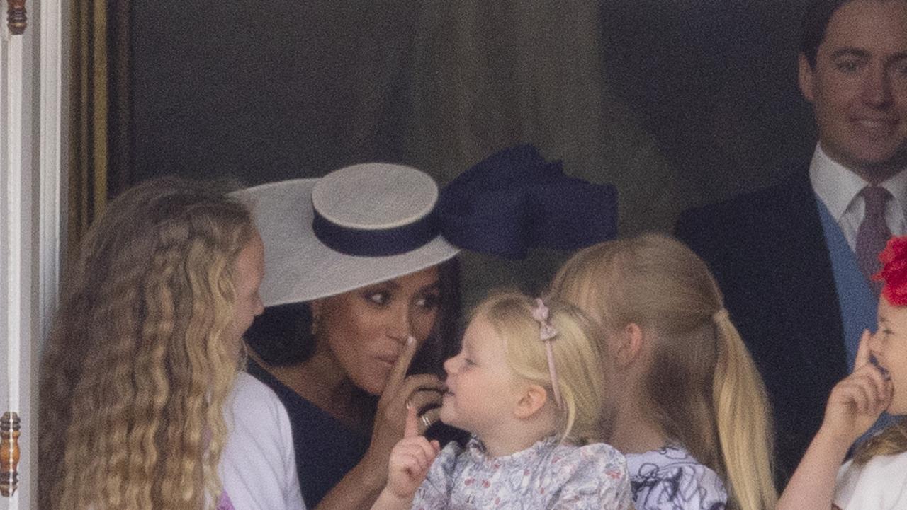 Meghan Markle with Savannah Phillips and Mia Tindall in the Major General's office overlooking the Trooping the Colour on Horse Guards Parade. Picture: Kelvin Bruce/Goffphotos