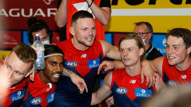 The Demons belt out the team song as they extended their winning sequence to 12. Picture: AFL Photos via Getty Images