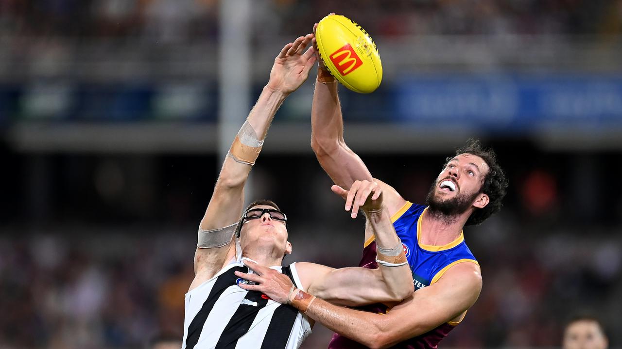 Darcy Fort (right), pictured with Collingwood’s Mason Cox, has been dropped by the Brisbane Lions. Picture: Albert Perez/AFL Photos via Getty Images