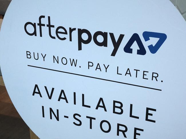 An Afterpay sign is seen in a store window in a shopping centre in Sydney, Tuesday, February 26, 2019. (AAP Image/Derek Rose) NO ARCHIVING