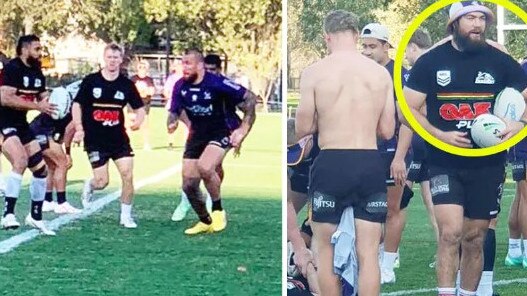 Storm players train in Penrith jerseys.