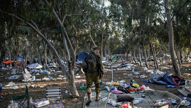 An Israeli soldier patrols on near Kibbutz Beeri, the place where 270 revellers were killed by militants during the Supernova music festival on October 7, 2023. Picture: AFP