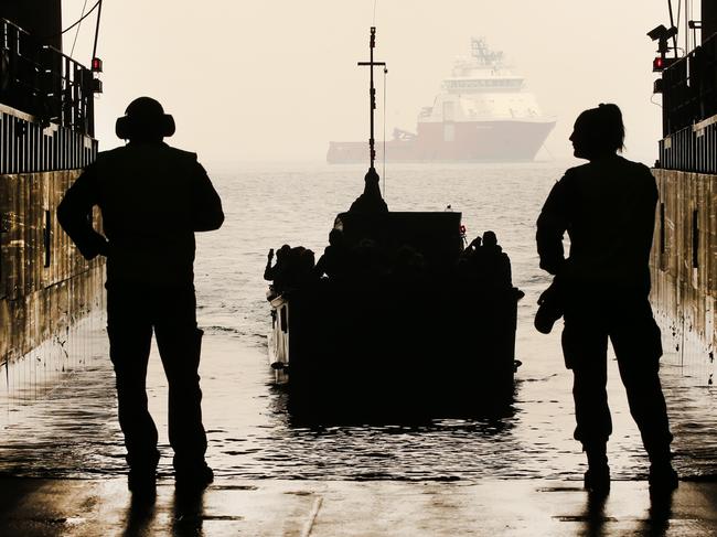 Mallacoota Fires evacuation. On board the HMAS Choules another boat load of evacuees arrives.         Picture: David Caird