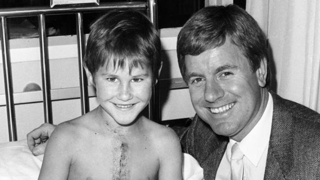 Mal Walden with young Royal Children’s Hospital patient Andrew McKinnon, promoting the Good Friday Appeal for Channel 7 in the 1980s. Picture: HWT