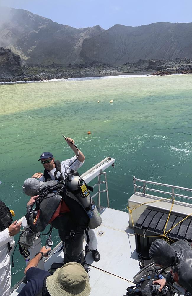 A team of nine from the Police National Dive Squad resumed their search for a body seen in the water following Monday's volcanic eruption. Picture: New Zealand Police