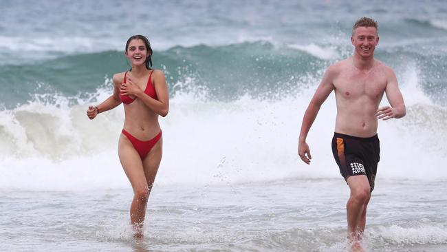 Felicity Parsons from Warwick State High and Nick Carrie from Iona at Surfers Paradise on The Gold Coast. Photograph: Jason O'Brien / Sunday Mail