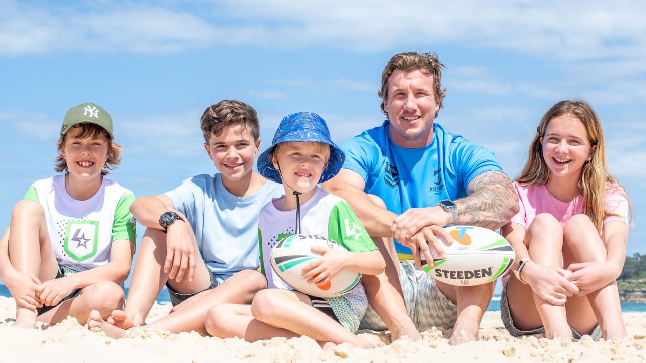 Former blues star Trent Hodkinson enjoying retirement and a little bit of beach footy with (L-R) Leroy Healey, Seth Ockenden, Lois Ockenden, and Harlan Healey. Picture Thomas Lisson