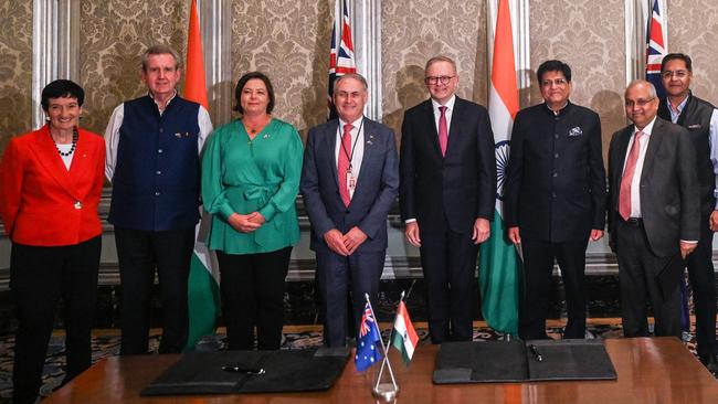 (L-R) Chief Executive of Business Council of Australia (BCA) Jennifer Westacott, High Commissioner of Australia to India Barry O' Farrell, Minister for Resources of Australia Madeleine King, Australian Senator and Minister for Trade and Tourism Don Farrell, Australia's Prime Minister Anthony Albanese, Indian Minister of Commerce and Industry Piyush Goyal, Director General of the Confederation of Indian Industry Chandrajit Banerjee and High Commissioner of India to Australia Manpreet Vohra pose after signing a partnership agreement at a meeting in Mumbai.