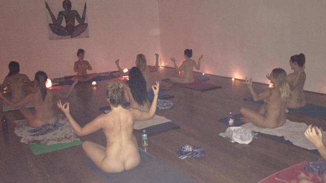 Stripping back insecurities at naked yoga.