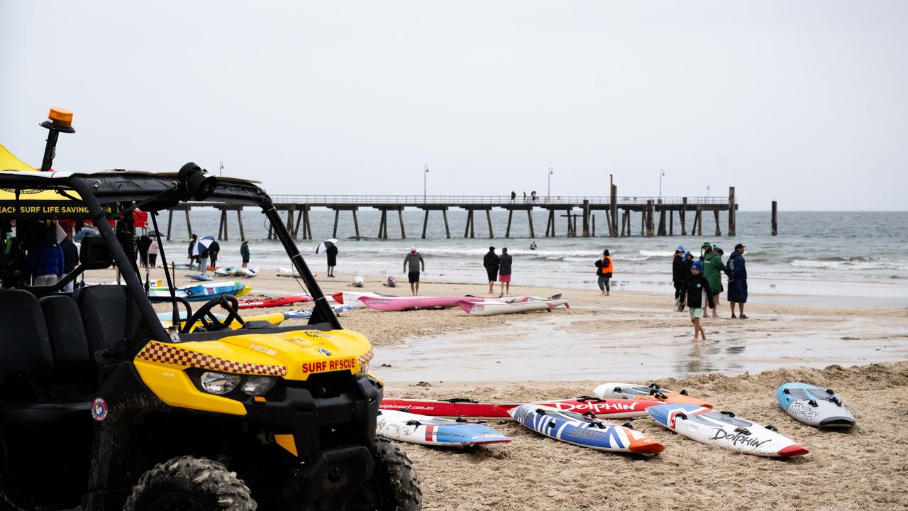 Wet weather at a competitive Surf Life Saving event at Glenelg Beach on Saturday. Picture: Morgan Sette