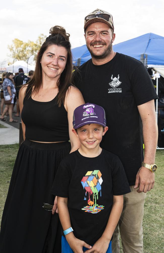 Malakai Lewis (front) with Taniesha Lewis and Jack Nichol at Lights on the Hill Trucking Memorial at Gatton Showgrounds, Saturday, October 5, 2024. Picture: Kevin Farmer