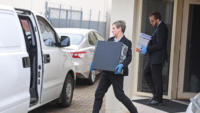 Major Crime detectives seize evidence from Integrity Care's office in Edwardstown in 2020. Picture: Tom Huntley