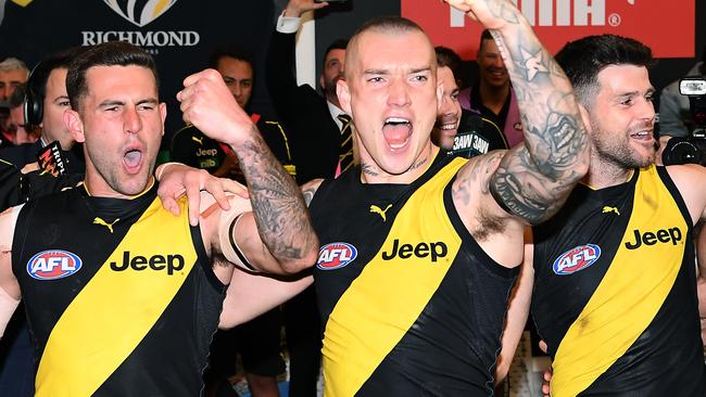 Graham sings the song alongside Dustin Martin and Trent Cotchin, but he knows he’s doubtful to play in the grand final. Pic: Getty Images