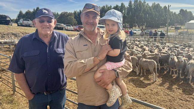 Buyer Peter Henry, Yulecart, with friends Phil Van Wegen and Amelie, 2, from Hamilton at the Casterton sale.