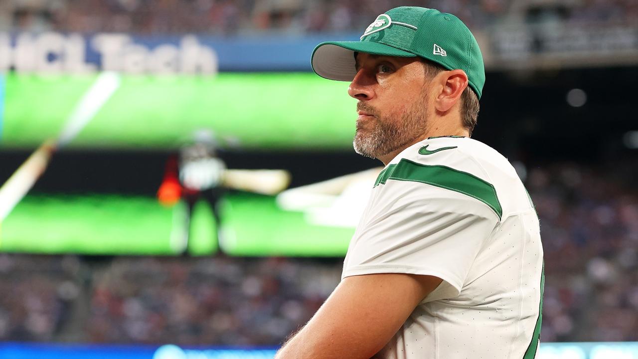 EAST RUTHERFORD, NEW JERSEY - AUGUST 26: Aaron Rodgers #8 of the New York Jets looks on from the sideline during the game against the New York Giants at MetLife Stadium on August 26, 2023 in East Rutherford, New Jersey. (Photo by Mike Stobe/Getty Images)