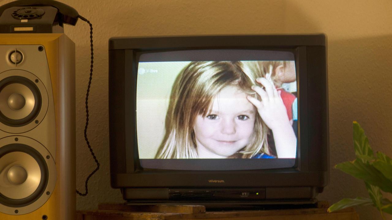 British girl Madeleine McCann aka Maddie is displayed on a TV screen at an apartment in Berlin, on October 16, 2013 during a broadcast appealing for more information. Picture: Johannes Eisele / AFP