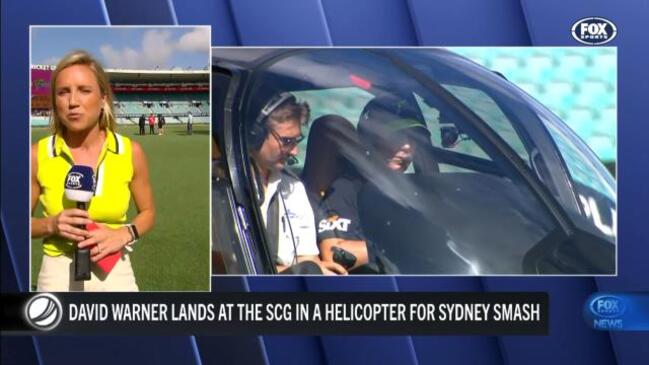 David Warner touches down on SCG in a helicopter ahead of the Sydney Smash