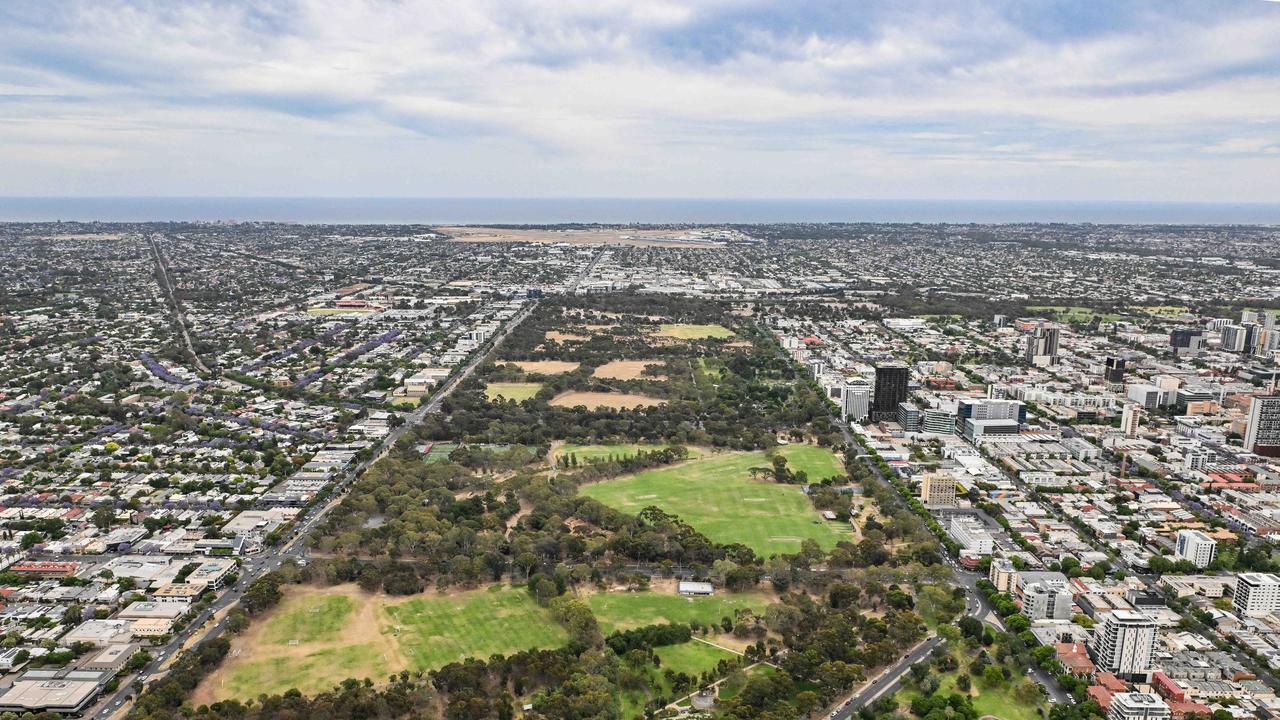 Looking over Adelaide from the air, over the south parklands. Picture: Brenton Edwards