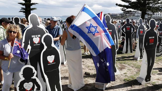 Jewish family and friends of hostages held by Hamas holding an event at Bondi Beach. Picture: Jonathan Ng