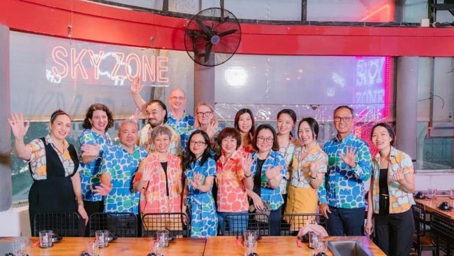 The Ho Chi Minh City consulate team in Ikuntji Artists shirts. Darwin-raised Sarah Hooper is centre back.