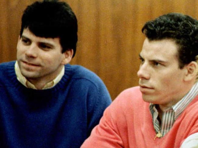 (FILES) (FILES) This 1992 file photo shows double murder defendants Erik (R) and Lyle Menendez (L) during a court appearance in Los Angeles, California. Lyle and Erik Menendez were resentenced May 13, 2025, for the murder of their parents in 1989, with a term that now opens the possibility of parole. A judge in Los Angeles said the men's term should be changed to one of 50 years to life, reducing their original sentence of life without the possibility of parole. (Photo by MIKE NELSON / AFP)