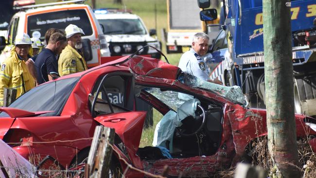 Multiple emergency services crews attended the scene after a red sedan Mitsubishi Lancer sedan crashed into a power pole on Rogans Bridge Rd north of Waterview Heights on Thursday, 18th February, 2021. Photo Bill North / The Daily Examiner