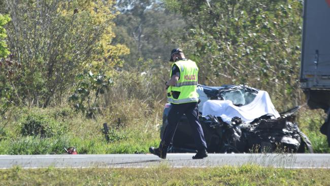 Police conduct their investigations at the scene of the fatal crash. Photo: Lachlan McIvor