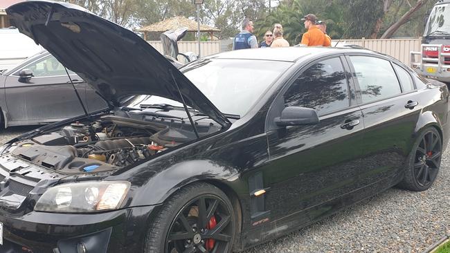 Three people were arrested and a number of firearms, vehicles and other property were seized by police during a search at a Virginia property this week. Picture: SAPOL