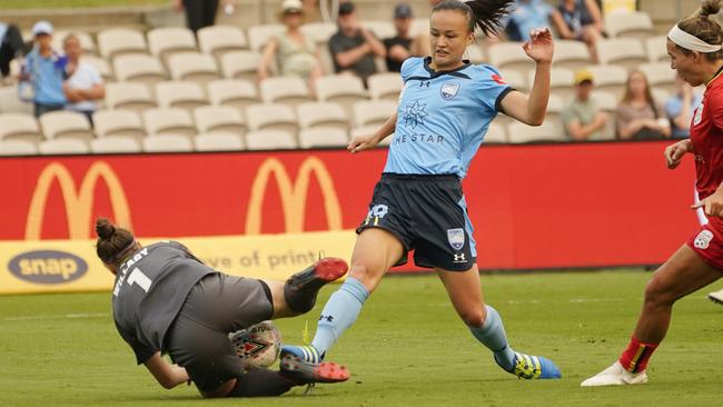 Adelaide United goalkeeper Sarah Willacy denies Amy Sayer with one of a string of excellent saves against Sydney FC. Picture: AAP Image/Mark Evans