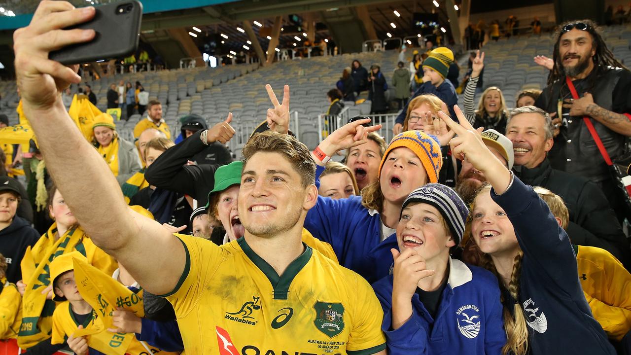 James O'Connor of the Wallabies takes selfies for fans at Optus Stadium.
