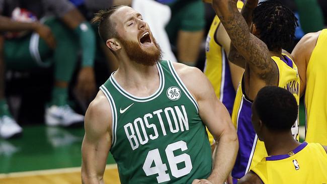 Boston Celtics' Aron Baynes (46) celebrates during the first quarter against the LA Lakers.