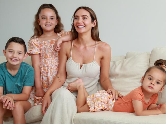 ** UNDER EMBARGO - PLEASE SPEAK TO DT PIC DESK BEFORE USE **  Rachael Lee with her children Addison, 10, Aleeia, 6, and Gigi, 2, at home today.Braith Anasta's wife Rachael Lee found out she had melanoma five weeks ago and is now raising awareness about the need to have annual skin checks. Picture:Justin Lloyd.