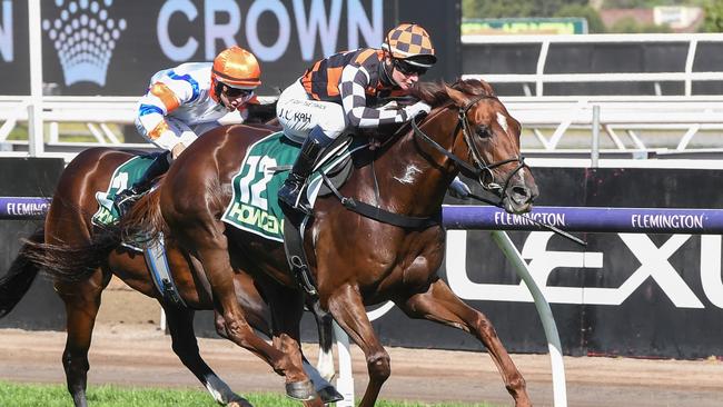 Southport Tycoon pulls away from Veight to win the Group 1 Australian Guineas at Flemington. Picture: Brett Holburt/Racing Photos via Getty Images