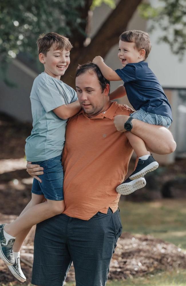 CJ Flood with his boys Seth, 11, and Cooper, 4.