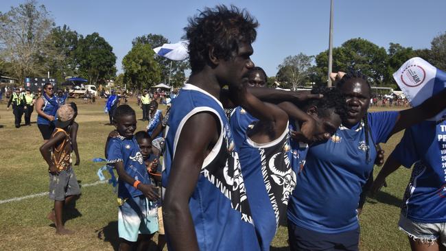 The Buffaloes celebrating in the Tiwi Island Football League grand final between Tuyu Buffaloes and Pumarali Thunder. Picture: Max Hatzoglou