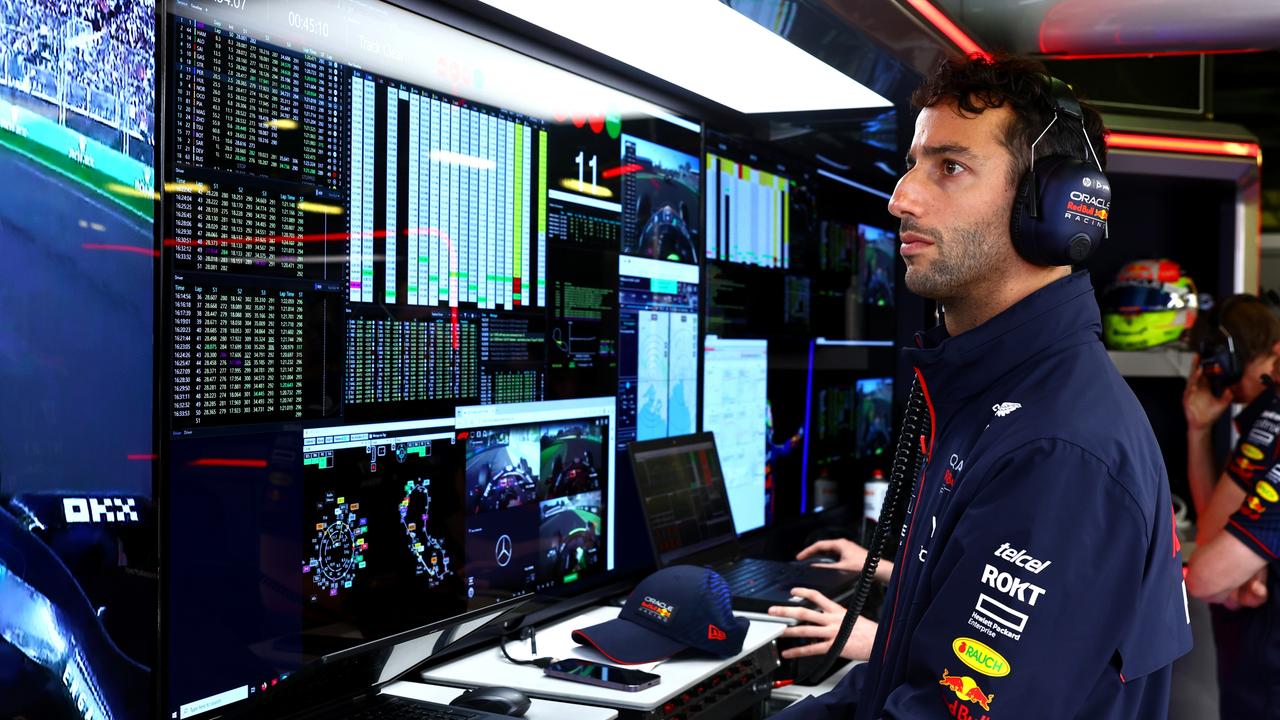 Daniel Ricciardo watches the action in the Red Bull Racing garage during the F1 Grand Prix of Australia at Albert Park. (Photo by Mark Thompson/Getty Images)