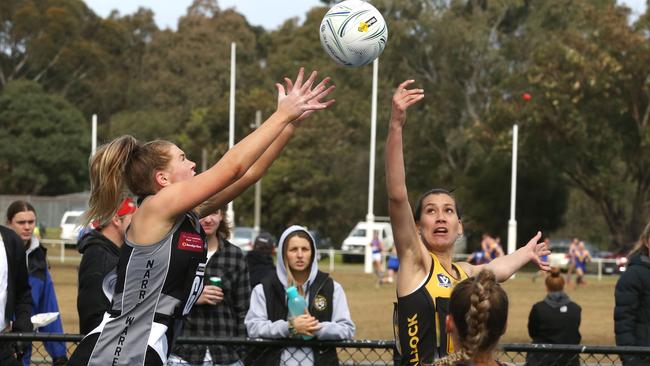 Woori Yallock and Narre Warren clash in the 2019 netball finals. Picture: Stuart Milligan