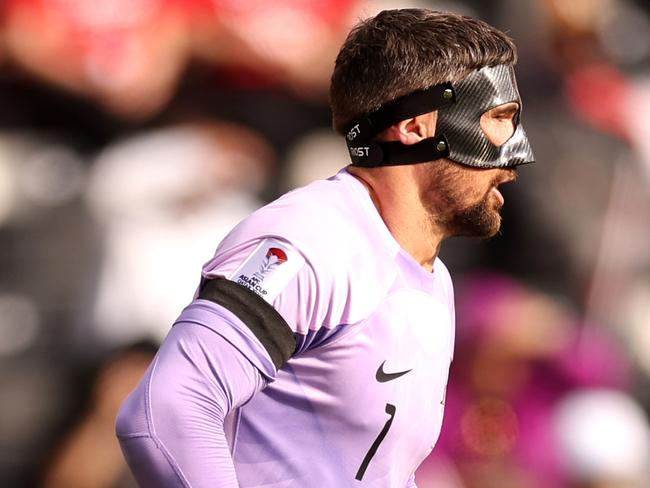 DOHA, QATAR - JANUARY 18: Mathew Ryan of Australia looks on whilst wearing a black armband in remembrance of Former Australia Player, Stephen Laybutt, during the AFC Asian Cup Group B match between Syria and Australia at Jassim Bin Hamad Stadium on January 18, 2024 in Doha, Qatar. (Photo by Robert Cianflone/Getty Images)