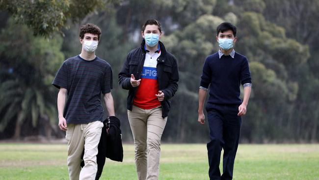 Sydney Technical High School students Adam Milosavijevic, L, Ambrose Konstantinidis and Huy Nguyen are to be a part of the Year 12 mass vaccination drive starting tomorrow. Picture: Jane Dempster