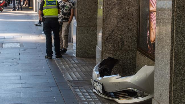 The bumper of the offender’s car ended up near the Gucci store on Collins St. Picture: Jason Edwards