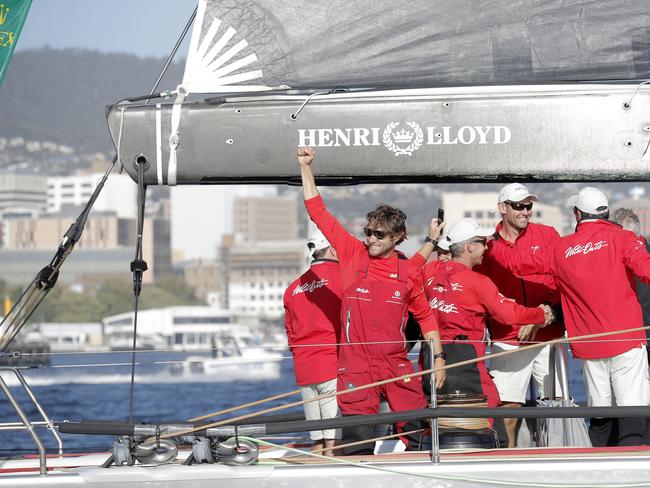 Daniel Oatley, The late Bob Oatley's grandson, celebrates, after steering Wild Oats across the line. Wild Oats XI skippered by Mark Richards claims a 9th line honours victory in the 2018 Sydney to Hobart Yacht Race. The yacht crossed the line in 1d 19hrs 7mins 21secs . Picture: RICHARD JUPE