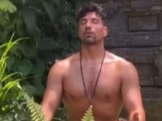 Hunt on for naked tourist at Bali shrine
