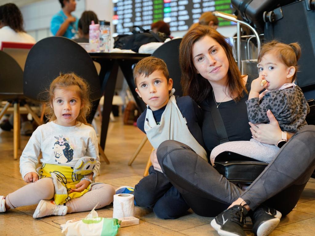 Melbourne mum of three Sally Aganova, with her children Mia, 3, Emma, 2, and Ariel, 5, is relieved to be heading back to Australia. Picture: Jordan Polevoy