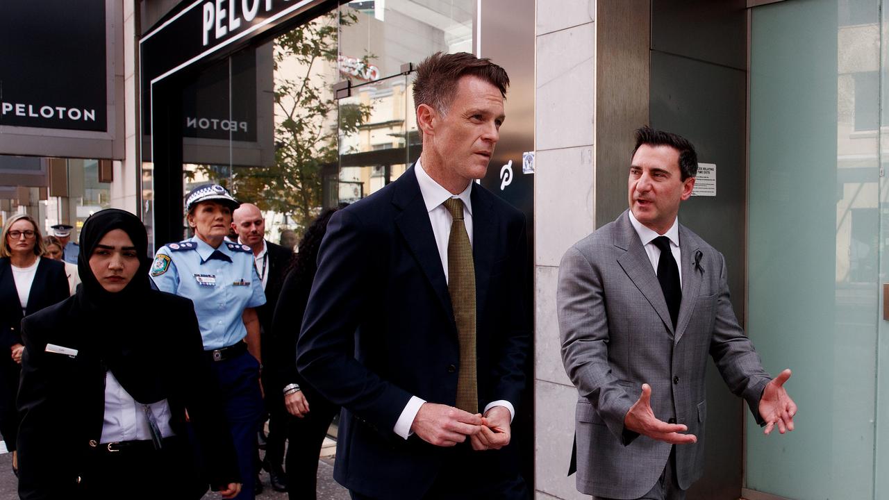 NSW Premier Chris Minns with Westfield’s Elliott Rusanow and Police Commissioner Karan Webb at Westfield on Thursday. Picture: NCA NewsWire / Nikki Short